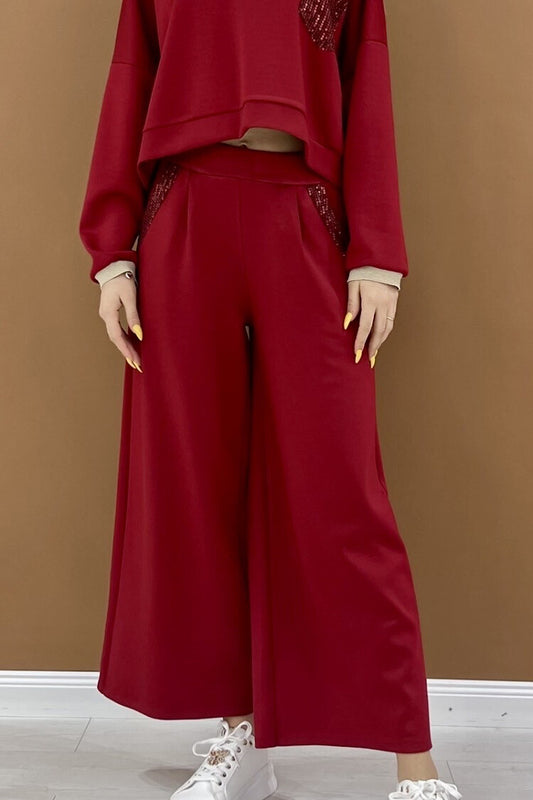 Pantalon large avec poches brillantes à sequins